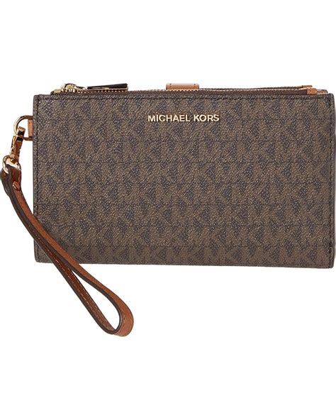 michael kors jet set star clutch|michael kors wristlets.